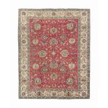 A fine Tabriz carpet
approx: 12ft.10in. x 10ft.2in.(392cm. x 309cm.)