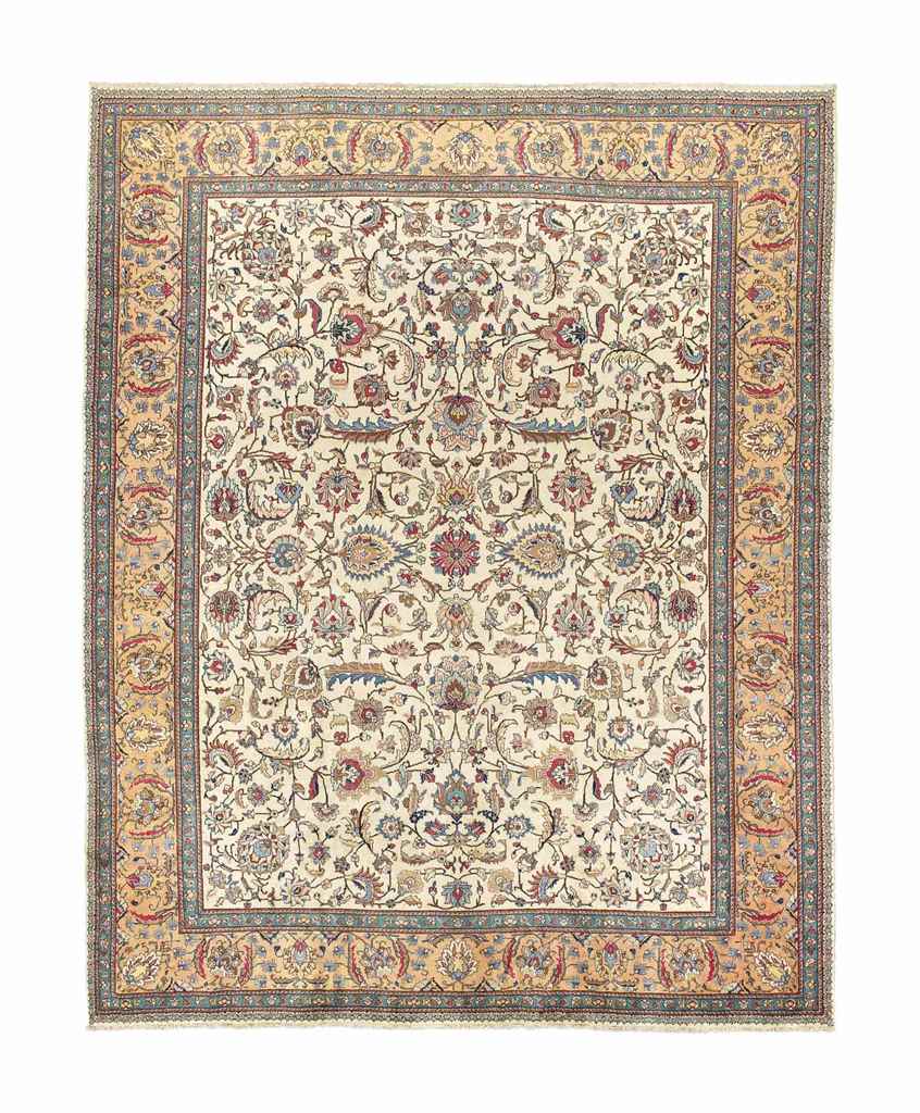 A fine Tabriz carpet
approx: 13ft.11in. x 10ft.11in.(425cm. x 332cm.)