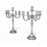 A PAIR OF CONTINENTAL SILVER FIVE-LIGHT CANDELABRA
PROBABLY GERMAN, STAMPED "830", WITH DUTCH IMPORT
