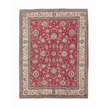 A fine Tabriz carpet
approx: 13ft.3in. x 10ft.1in.(403cm. x 307cm.)