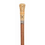 A WILLIAM III IVORY AND PIQUE INLAID MALACCA WALKING CANE
CIRCA 1696
The ivory handle decorated with