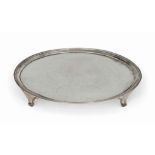 A GEORGE III PLAIN CIRCULAR SILVER SALVER
MARK OF SMITH & SHARP, LONDON, 1787
With reeded rim, on