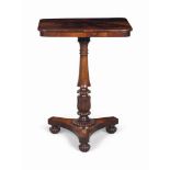 A GEORGE IV ROSEWOOD OCCASIONAL TABLE
CIRCA 1825
In the manner of Gillows, with a lotus carved and