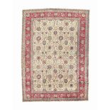 A fine Tabriz carpet
approx: 15ft.11in. x 11ft.6in.(485cm. x 350cm.)