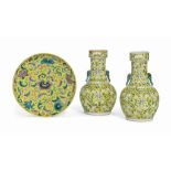 A PAIR OF CHINESE YELLOW GROUND VASES AND A DISH
19TH CENTURY
The vases are each applied with two