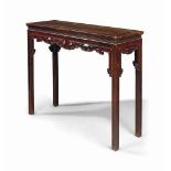 A CHINESE TIELIMU SIDE TABLE
LATE 19TH CENTURY
The table is decorated with a carved keyfret band