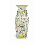 A CHINESE HEXAGONAL FAMILLE ROSE 'HUNDRED ANTIQUES' VASE
19TH CENTURY
The vase is moulded and