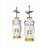 A PAIR OF CHINESE FAMILLE ROSE TWO-HANDLED VASES
MODERN
Each vase decorated with a stylised