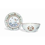 A CHINESE FAMILLE VERTE 'MANDARIN DUCK AND IMMORTALS' DISH AND A FAMILLE ROSE ARMORIAL BOWL
THE DISH