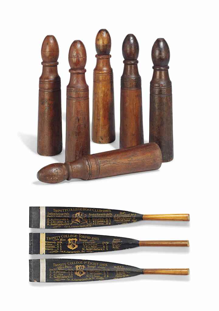 A SET OF SIX TURNED ELM SKITTLES
19TH CENTURY
19 in. (48 cm.) high
Together with three Painted