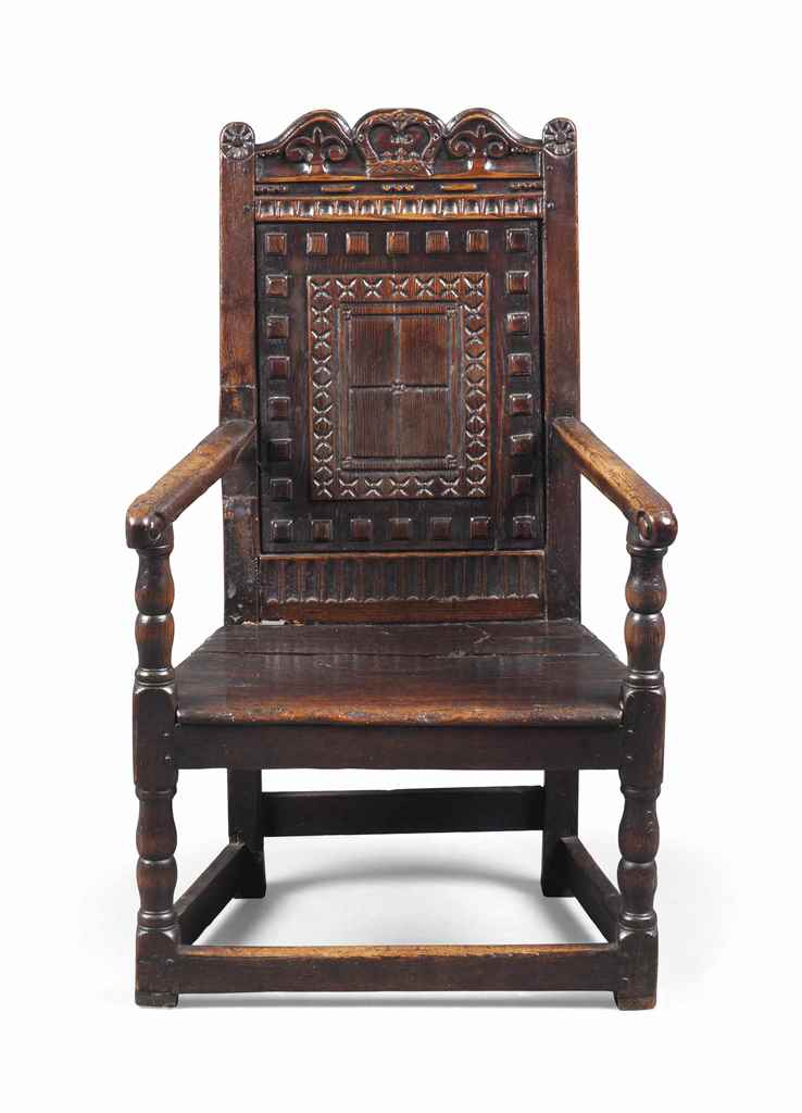 A LATE ELIZABETHAN / JAMES I FIGURED PINE ARMCHAIR
LATE 16TH / EARLY 17TH CENTURY, SCOTTISH
The