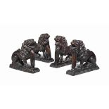 A SET OF FOUR ITALIAN WALNUT MODELS OF HERALDIC LIONS
IN RENAISSANCE STYLE, 19TH CENTURY
Each with a