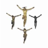 FOUR ITALIAN BRONZE CRUCIFIX FIGURES
LATE 16TH CENTURY AND LATER
Three larger with gilding, the