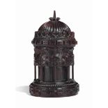 A LARGE EARLY VICTORIAN ORNAMENTALLY TURNED LIGNUM VITAE TOBACCO JAR
CIRCA 1840
In the form of a