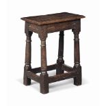 A CHARLES II OAK JOINED STOOL
LATE 17TH CENTURY
With twin-channelled friezes and moulded