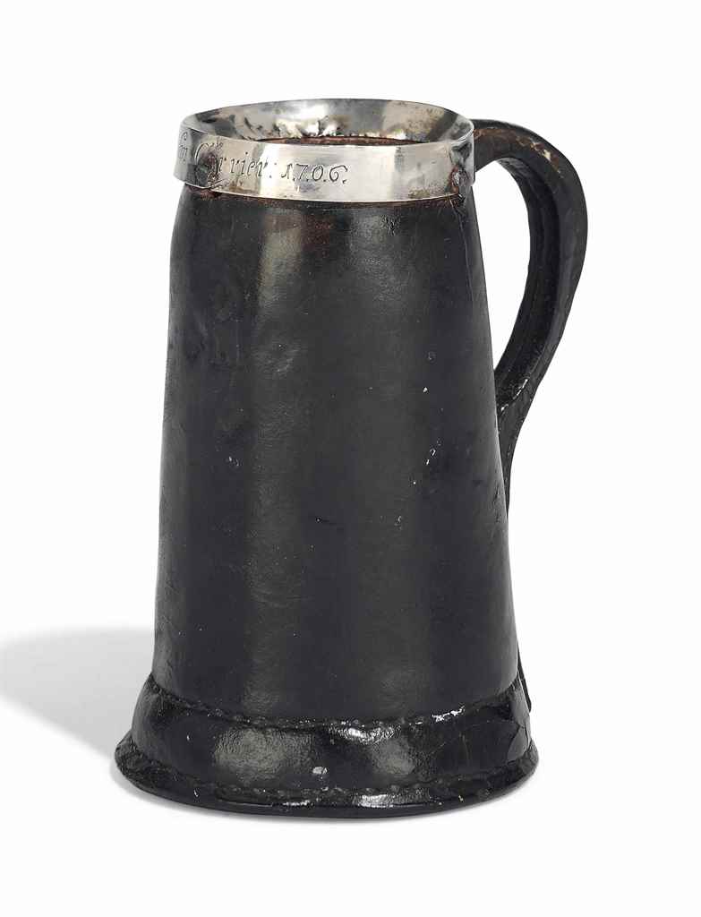 A QUEEN ANNE LEATHER BLACKJACK
DATED 1706
The silver rim inscribed 'John Carrier 1706' 
5 ½ in. (