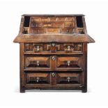 A WILLIAM AND MARY OAK BUREAU
LATE 17TH CENTURY
The interior with an arrangement of twelve drawers