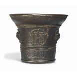 AN ITALIAN BRONZE MORTAR
CIRCA 1589
One side cast with an armorial shield, the other the Holy