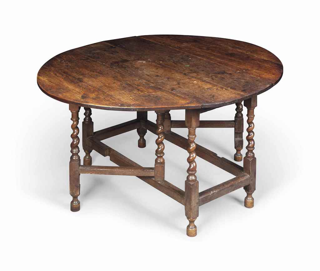 A GEORGE II OAK GATE-LEG TABLE
EARLY 18TH CENTURY
With oval top, spiral legs and square stretchers