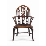 A GEORGE III GOTHIC YEW WINDSOR ARMCHAIR
LATE 18TH CENTURY
With pierced tracery splats including