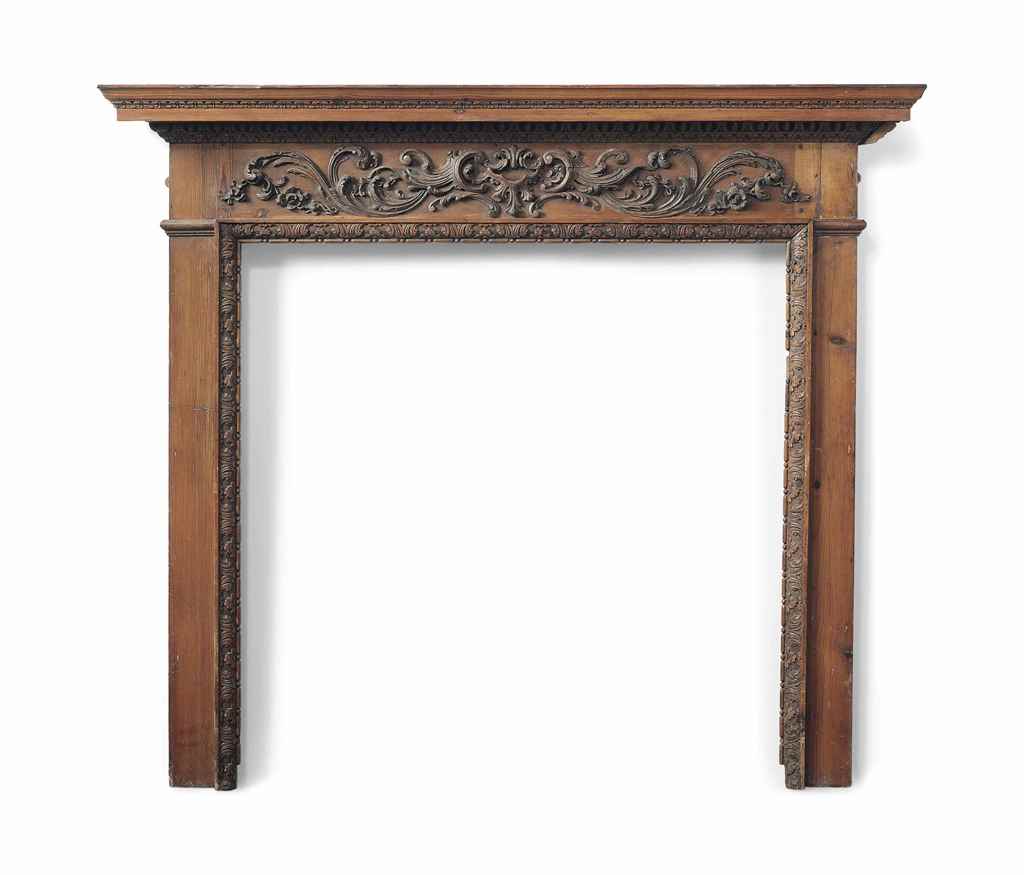 A GEORGE III PINE CHIMNEYPIECE
LATE 18TH CENTURY
The frieze carved and applied with rococo 'C'