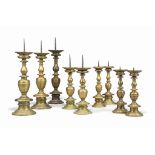 FOUR PAIRS OF ITALIAN BRASS PRICKET ALTARSTICKS
MOST 18TH CENTURY
Each with baluster stem and dished