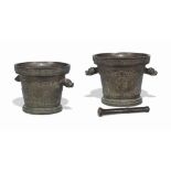 A LARGE AND FINE ITALIAN BRONZE MORTAR
DATED 1709
With grotesque animal mask handles, the tapering