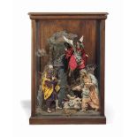 A NEAPOLITAN PRESSEPIO GROUP OF THE HOLY FAMILY WITH AN ANGEL
EARLY 19TH CENTURY
The figures with