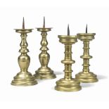 A PAIR OF FLEMISH OR ITALIAN BRASS PRICKET CANDLESTICKS
17TH OR 18TH CENTURY
Of baluster form on a