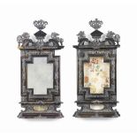 A PAIR OF ITALIAN SILVER MOUNTED EBONISED-WOOD RELIQUARY FRAMES
LATE 18TH / EARLY 19TH CENTURY