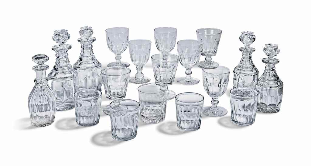 A COMPOSITE CUT-GLASS TABLE-SERVICE
CIRCA 1840 AND LATER
Comprising: two pairs of decanters and