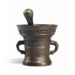 A DUTCH BRONZE MORTAR
DATED 1624, PROBABLY 17TH CENTURY
Cast with two foliate relief bands and a