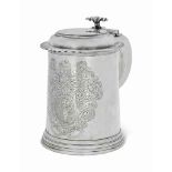 A QUEEN ANNE IRISH SILVER TANKARD
MARK OF DAVID KING, DUBLIN, 1702, THE HANDLE MARK OF EDWARD