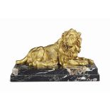 AN ITALIAN GILT-BRONZE MODEL OF A RECLINING LION
19TH CENTURY
With hammered surface, set on a