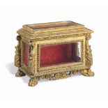 AN ITALIAN GILTWOOD RELIQUARY CASE
18TH CENTURY
With beaded glazed panels, the corners carved with