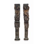 A PAIR OF NORTH ITALIAN WALNUT ANGEL CARYATID STILES
18TH CENTURY
Carved in deep relief with