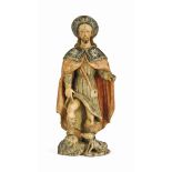 A SPANISH OR SPANISH COLONIAL CARVED WOOD AND POLYCHROME FIGURE OF SAINT ROCH
18TH CENTURY
The saint