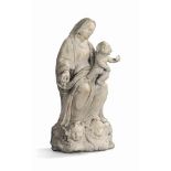 AN ITALIAN MARBLE GROUP OF THE VIRGIN AND CHILD
17TH CENTURY
Standing on a cloud base with two angel