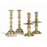 A PAIR OF DUTCH BRASS HEEMSKERK CANDLESTICKS
LATE 18TH CENTURY
each with domed base and mid drip