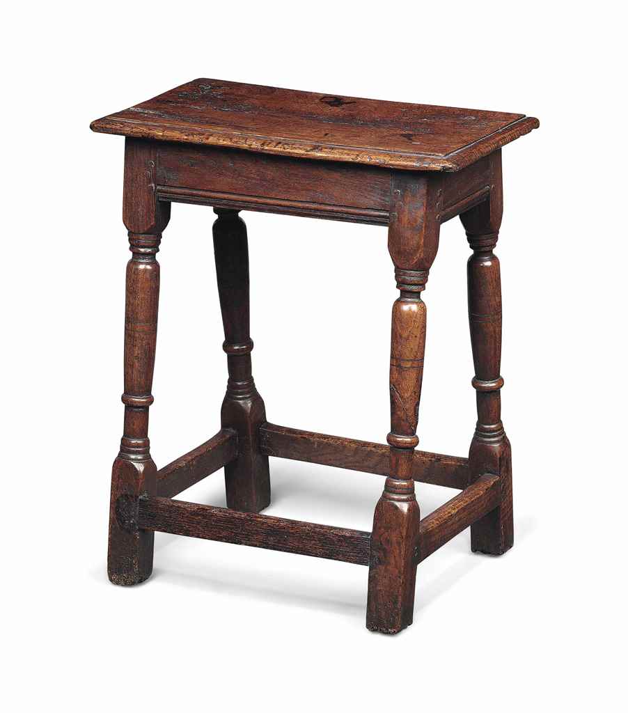 A CHARLES II OAK JOINED STOOL
MID 17TH CENTURY
With plain friezes and slender turned legs with