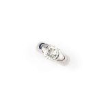 A diamond single stone ring, by Gubelin
The brilliant-cut diamond within a partial collet setting,