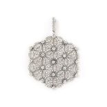 A diamond pendant
Of openwork flowerhead design, the flexible plaque set throughout with brilliant-