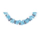 A topaz and sapphire suite and a cultured pearl necklace
The necklace composed of briolette-cut