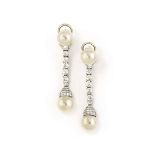 A pair of cultured pearl and diamond earrings
Each cultured pearl drop, measuring approximately 9.