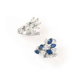 A diamond cluster ring and a diamond and sapphire cluster ring
Each of similar design, one