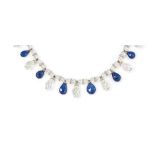 A rock crystal, sapphire and diamond necklace and pair of earrings
The necklace composed of a