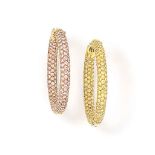 A pair of coloured diamond earrings
Each hoop pavé-set to the front and interior reverse with either