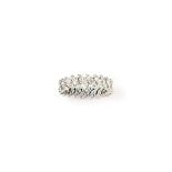 A diamond eternity ring, by Van Cleef & Arpels
Set with a continuous row of marquise-cut diamonds,