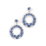 A pair of sapphire and diamond earrings
Each rose-cut sapphire and brilliant-cut diamond accent in