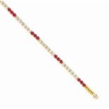 A RUBY AND DIAMOND LINE BRACELET
Composed of alternating circular-cut ruby three-stone and